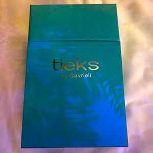 BRAND NEW Outrageous Orange Tieks-size 9
